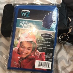 Adult Poncho. One size fits all. Unopened, unused.